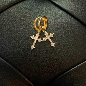 Earrings fashion jewelry cross with diamonds.